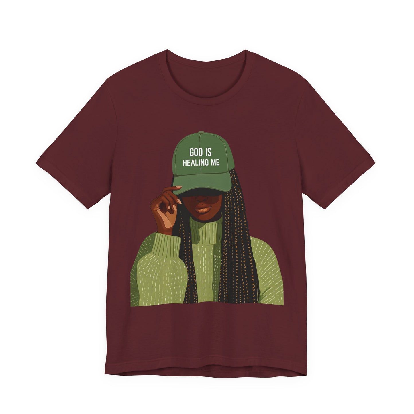 God Is Healing Me Tee — Inspirational Faith T‑Shirt with Green Cap Graphic