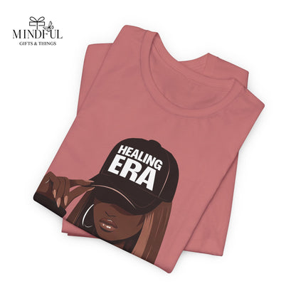 Healing Era Tee — Black Woman Graphic T‑Shirt with 'Healing ERA' Cap Design
