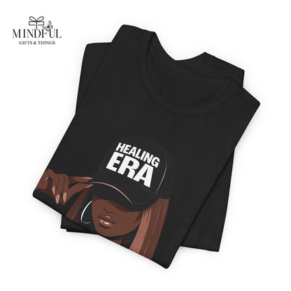 Healing Era Tee — Black Woman Graphic T‑Shirt with 'Healing ERA' Cap Design