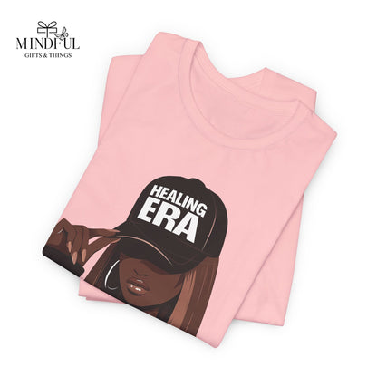 Healing Era Tee — Black Woman Graphic T‑Shirt with 'Healing ERA' Cap Design