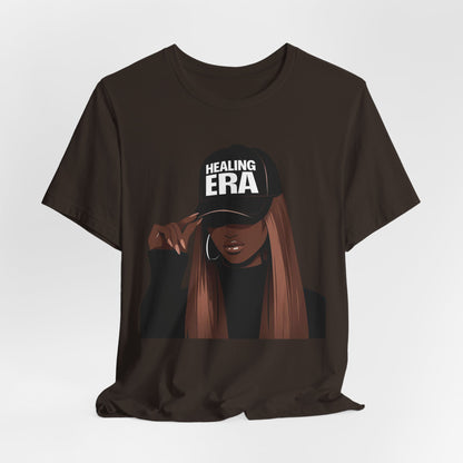 Healing Era Tee — Black Woman Graphic T‑Shirt with 'Healing ERA' Cap Design