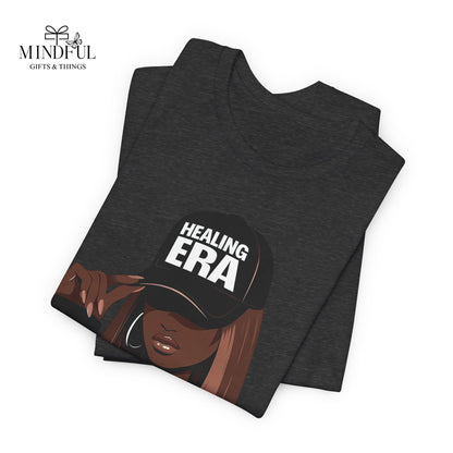 Healing Era Tee — Black Woman Graphic T‑Shirt with 'Healing ERA' Cap Design