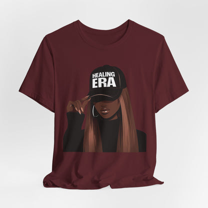 Healing Era Tee — Black Woman Graphic T‑Shirt with 'Healing ERA' Cap Design