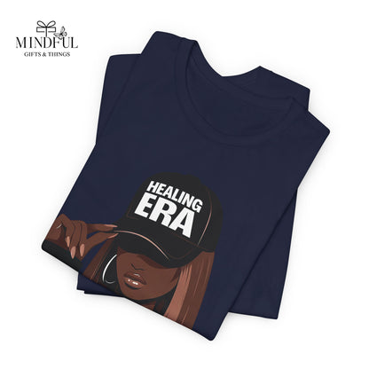 Healing Era Tee — Black Woman Graphic T‑Shirt with 'Healing ERA' Cap Design