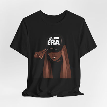 Healing Era Tee — Black Woman Graphic T‑Shirt with 'Healing ERA' Cap Design